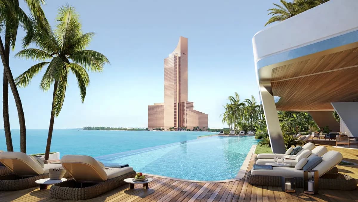 Waterfront tower and infinity pool in a VM Properties community