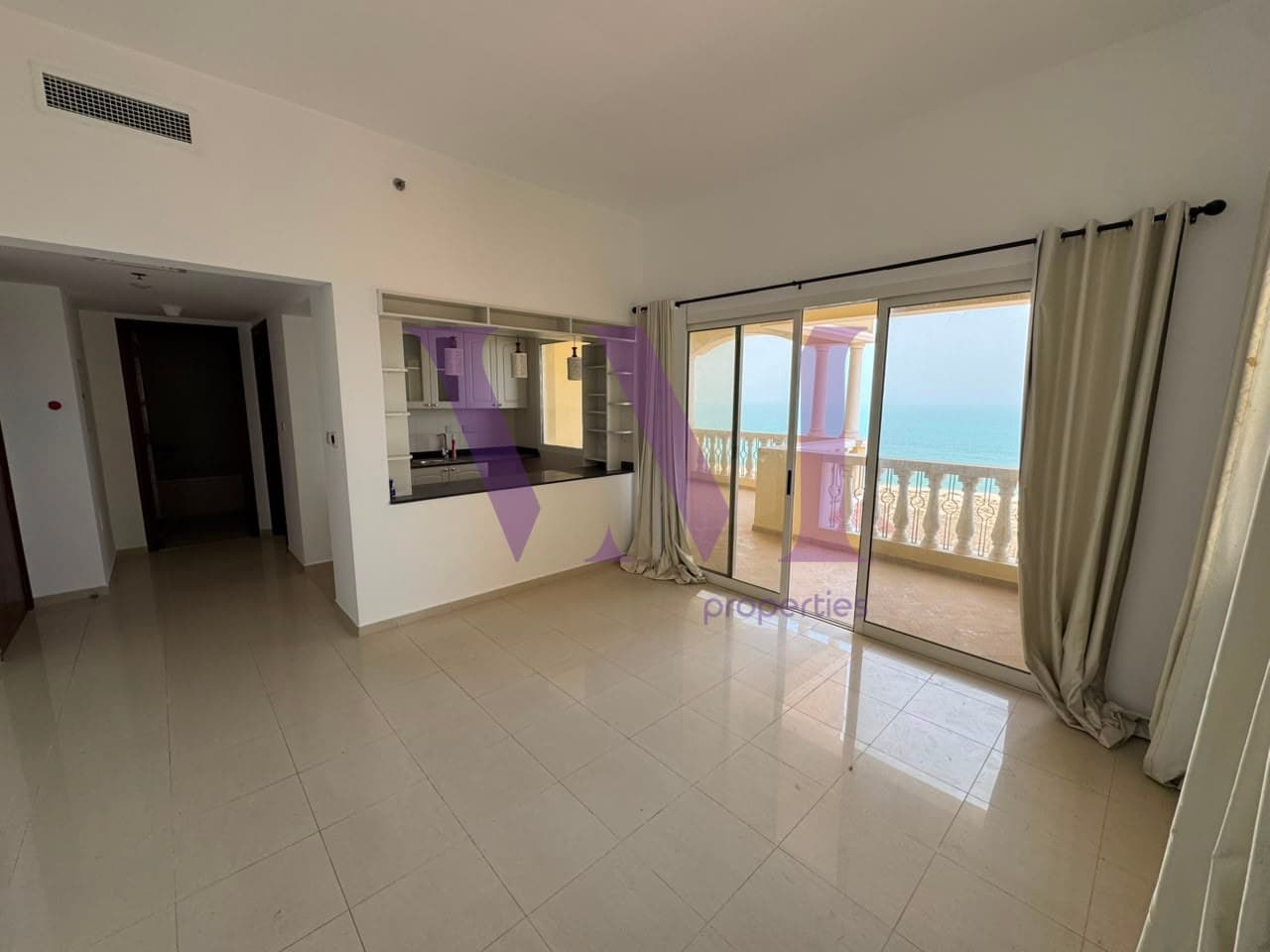 1BR | Sea View | Largest L-Shaped Balcony — Al Hamra Village