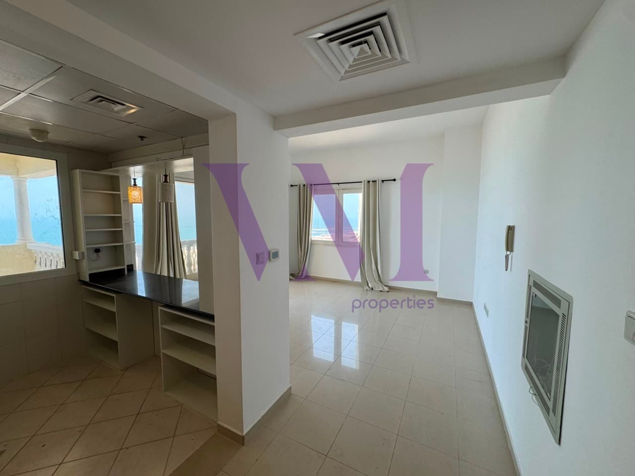 1BR | Sea View | Largest L-Shaped Balcony — Al Hamra Village