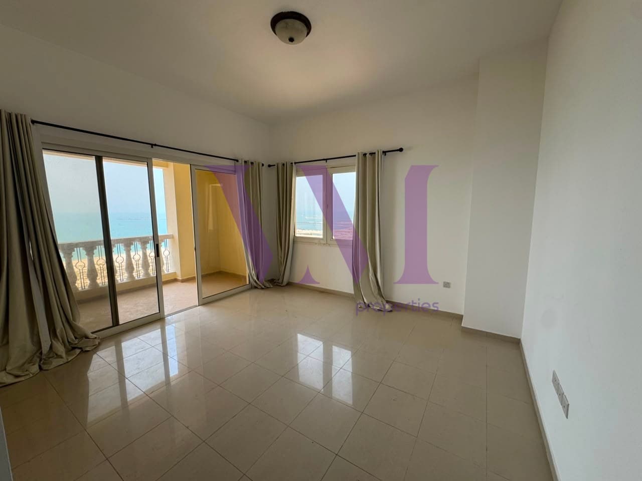 1BR | Sea View | Largest L-Shaped Balcony — Al Hamra Village